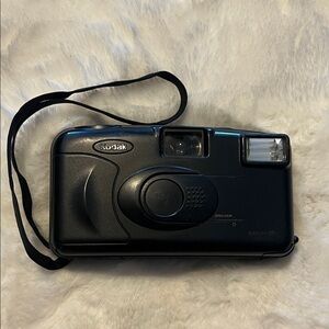 Vintage Kodak KB10 35mm point-and-shoot film camera.